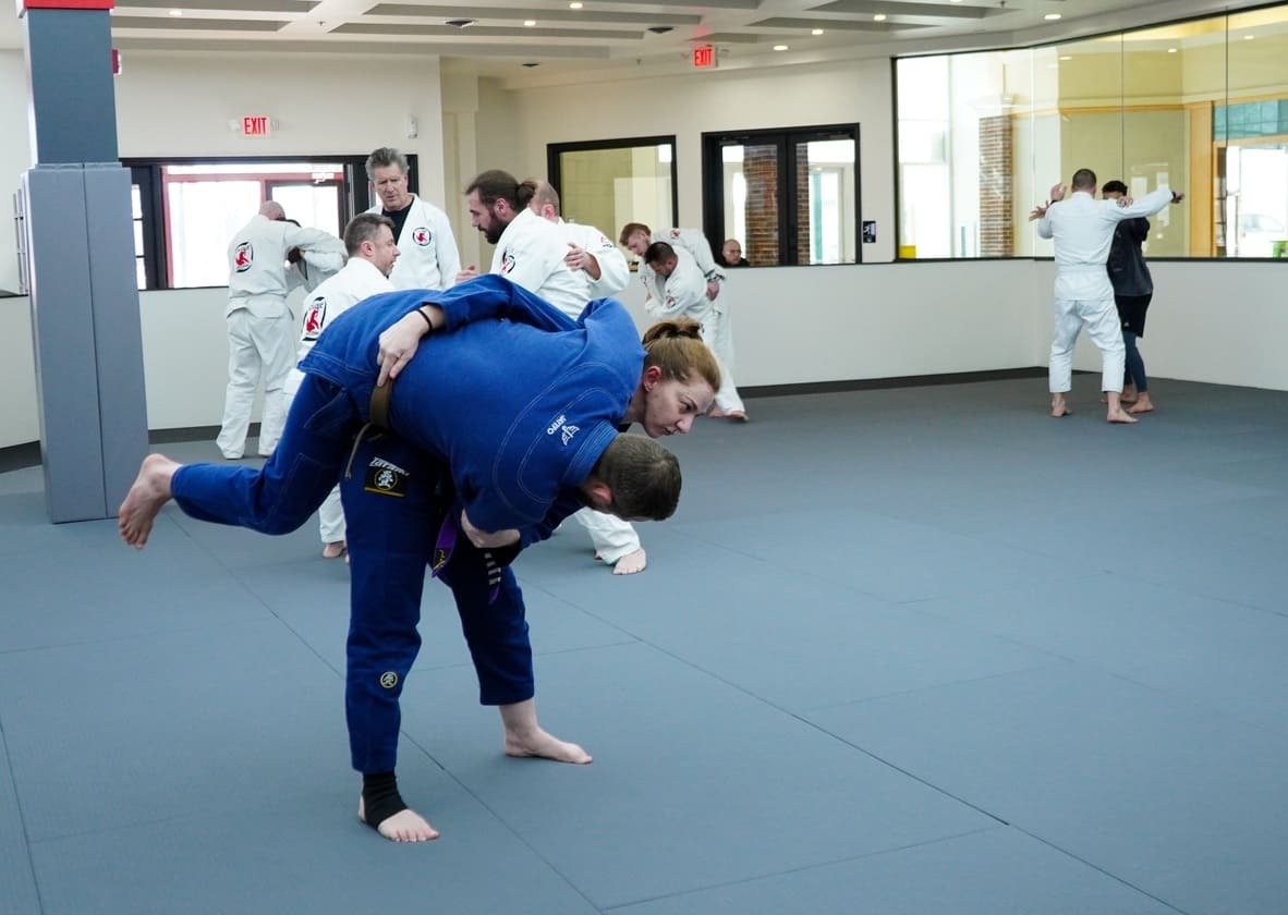 Men and women training Brazilian Jiu-Jitsu for self-defense in Novi Michigan
